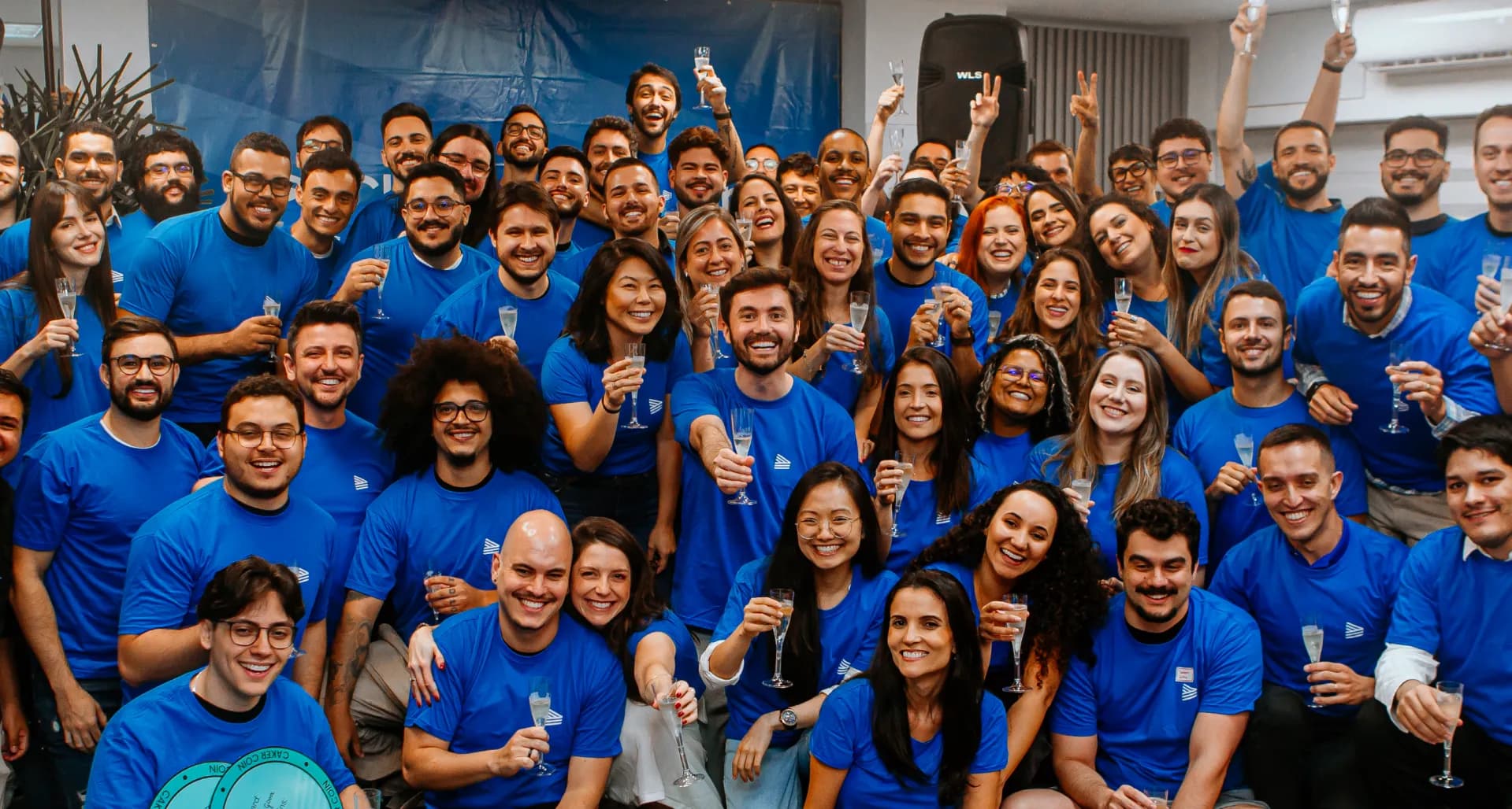 The Cheesecake Labs team together in blue shirts