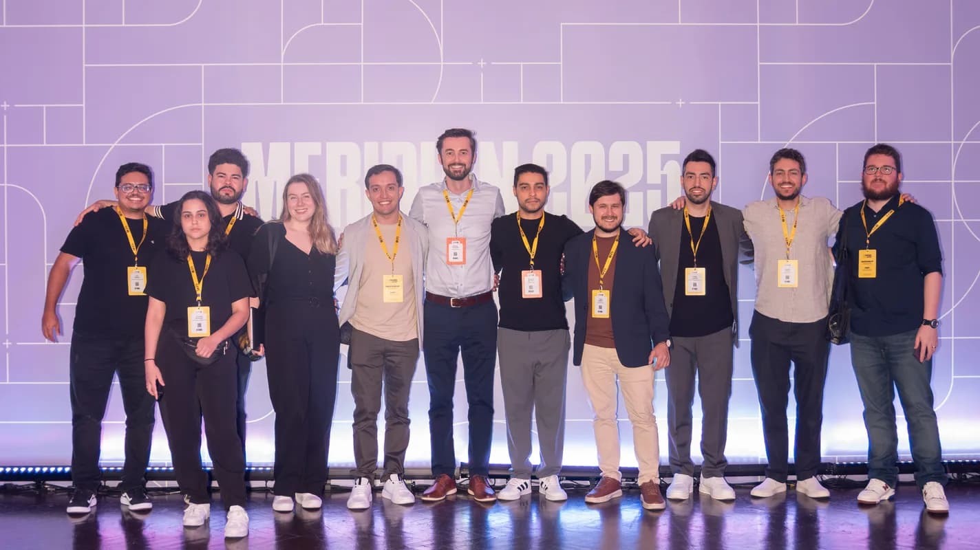 Cheesecake Labs team on stage at a conference